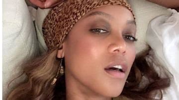 Tyra Banks stuns in barely there photos in her bed